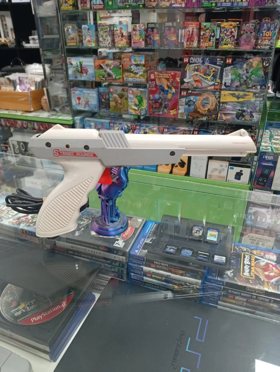 Pistola de luz Stereo Sounds para consola FamilyGame — foto 1