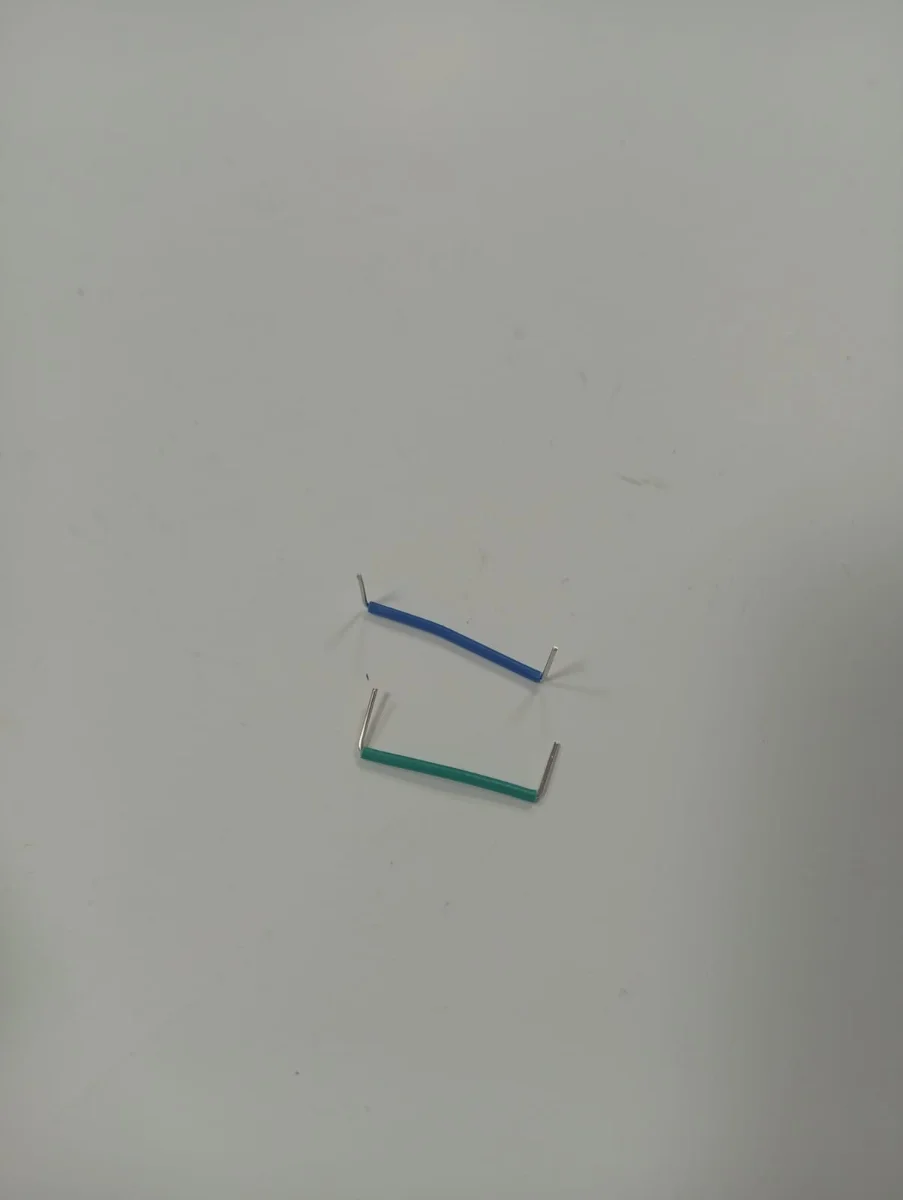 Par de terminales/cables eléctricos con funda