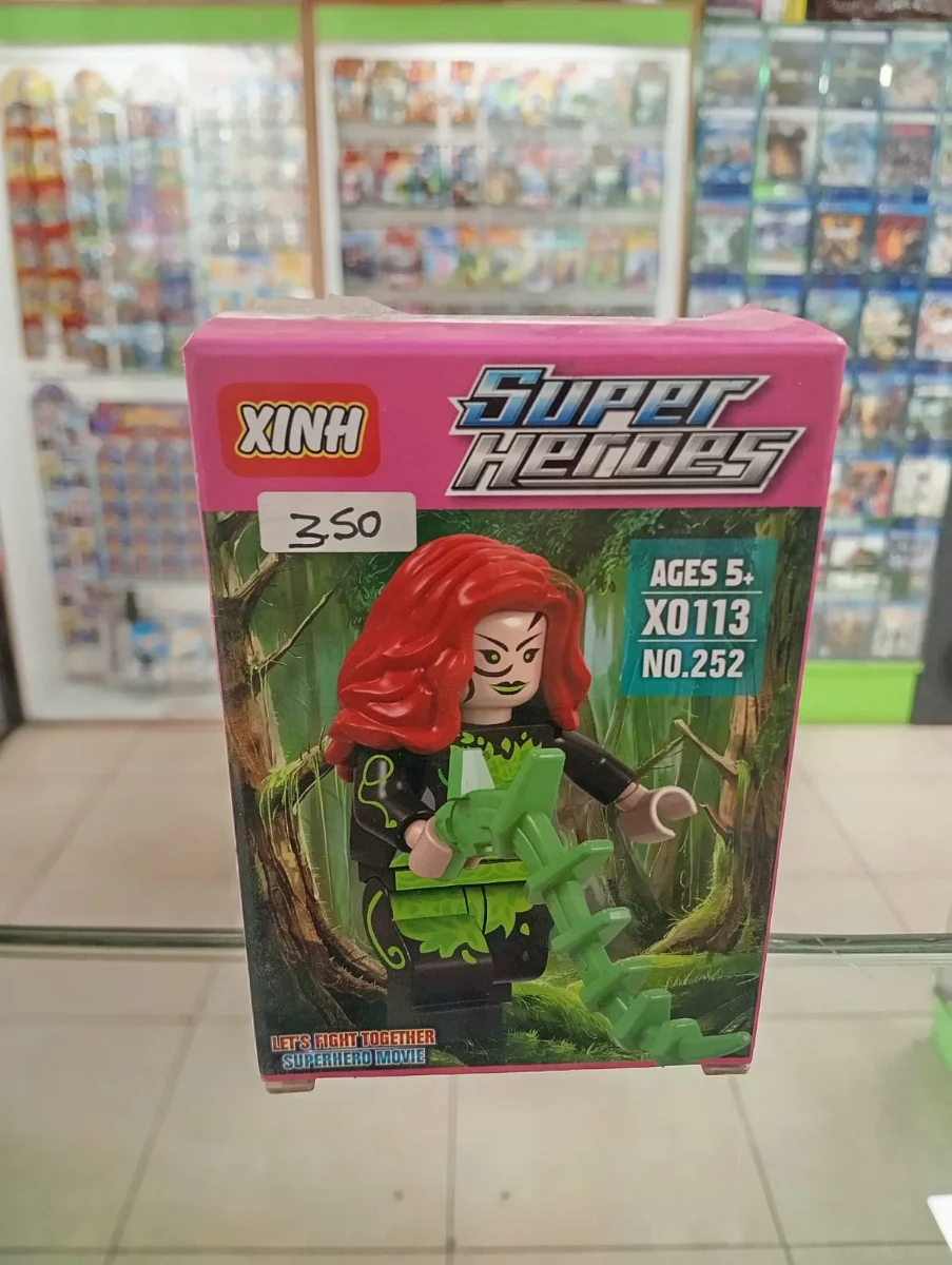 Figura armable Super Heroes de heroína pelirroja con traje verde